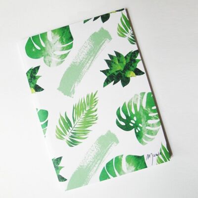 Notizbuch mit grünen Blättern