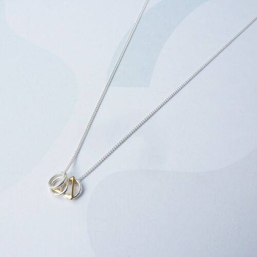 Jessi Necklace- silver necklace with gold and silver geometric charms