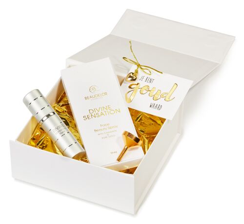 ON YOUR WAY box: A box with the Divine Sensation Face Beauty travel size (10ml) and a nice refillable silver perfume spray.