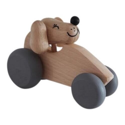 Wooden dog in car