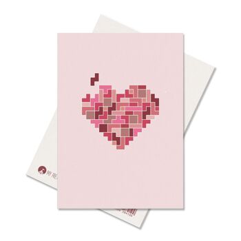 Carte postale avec un puzzle coeur en rose rouge comme carte pour un anniversaire, la fête des mères, un mariage ou comme message d'amour pour la Saint Valentin, carte coeur amour 2