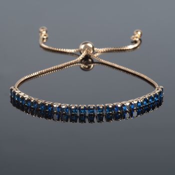 Bracelet Doré Ajustable pour Femme avec Pierres Bleues 1