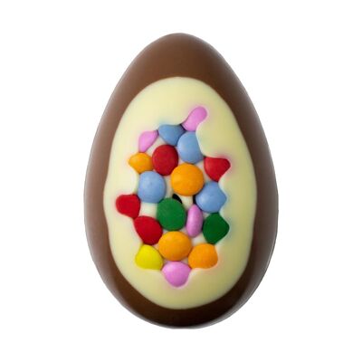 Mini uovo di Pasqua ricoperto di cioccolato al latte