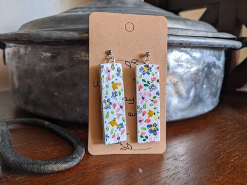 Delicate clay earrings with hand painted flowers