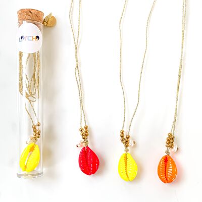 Neon cowrie necklace in its tube