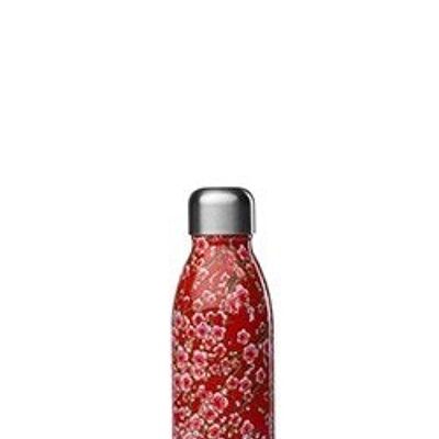 Una botella de 500 ml, flores rojas