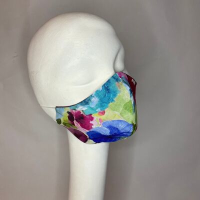 Multi coloured abstract print cotton with mauve silk lining and white elastic.