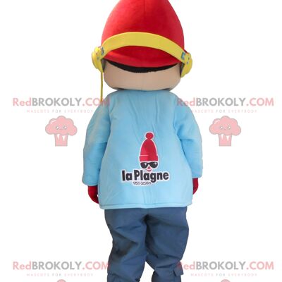 Little boy REDBROKOLY mascot on winter vacation