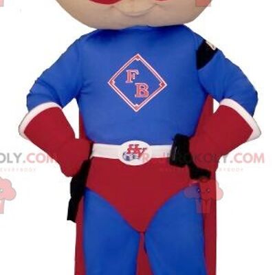 Little boy REDBROKOLY mascot dressed in superhero outfit