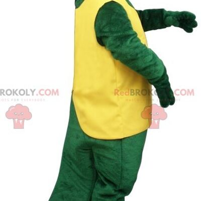 Green crocodile REDBROKOLY mascot in yellow and red outfit