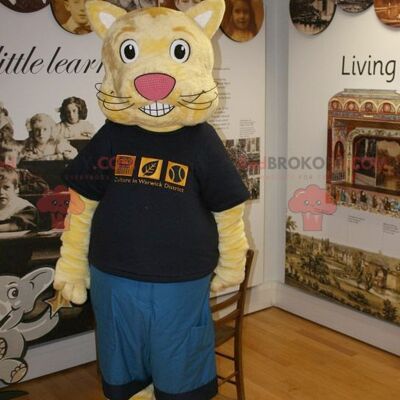 Yellow cat REDBROKOLY mascot in blue and black outfit