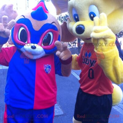 2 REDBROKOLY mascots: a yellow bear and a blue and red masked animal
