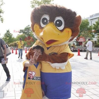 Giant brown and white bird REDBROKOLY mascot