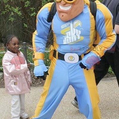 Superhero REDBROKOLY mascot in blue and yellow outfit , REDBROKO__0396
