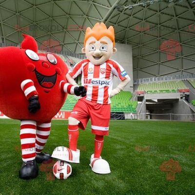 2 REDBROKOLY mascots a giant red heart and a footballer , REDBROKO__0464