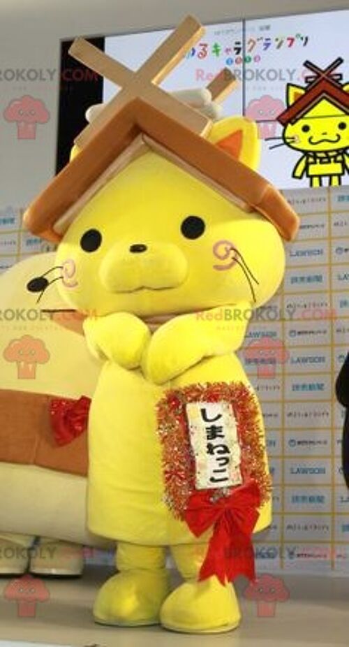 Yellow cat REDBROKOLY mascot with a house roof on the head , REDBROKO__0596