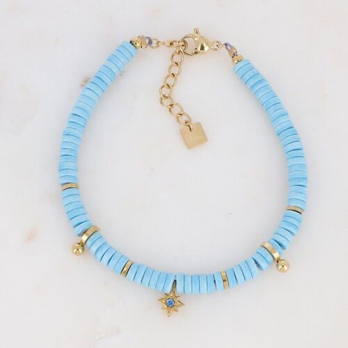 Bracelet Kenza doré avec pierres teintées bleues claires et cristal bleu