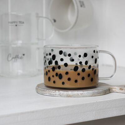 Tasse en verre noire à pois