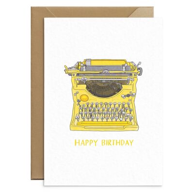 Carte d'anniversaire jaune de machine à écrire