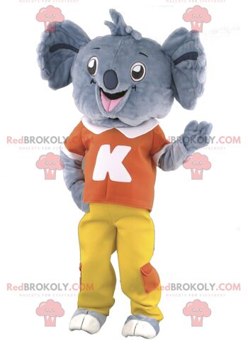 Mascotte de lionceau REDBROKOLY en tenue verte / REDBROKO_01875