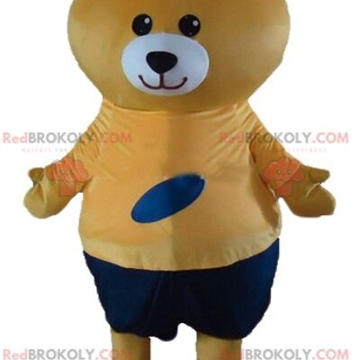 Brown bear REDBROKOLY mascot dressed in a very colorful outfit / REDBROKO_02596
