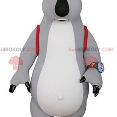 Mascotte d'oiseau blanc REDBROKOLY habillé en tenue d'aviateur colorée / REDBROKO_04751