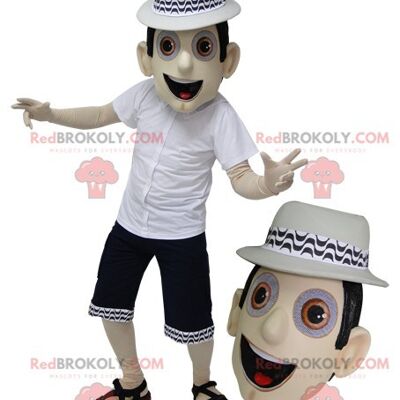 REDBROKOLY mascot man in overalls and orange cap. / REDBROKO_06577
