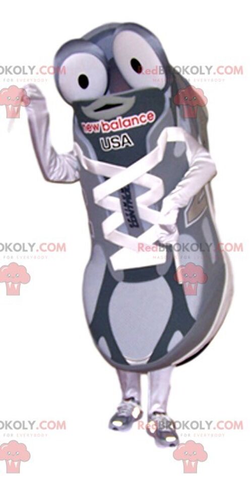 Boy REDBROKOLY mascot in sportswear with a cap / REDBROKO_012330
