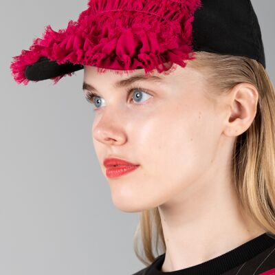 Asclepius black cap with red ruffles