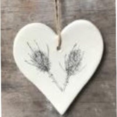 Corazón colgante con diseño de cardo de semilla botánica