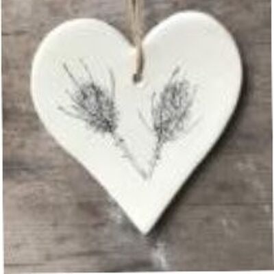 Corazón colgante con diseño de cardo de semilla botánica