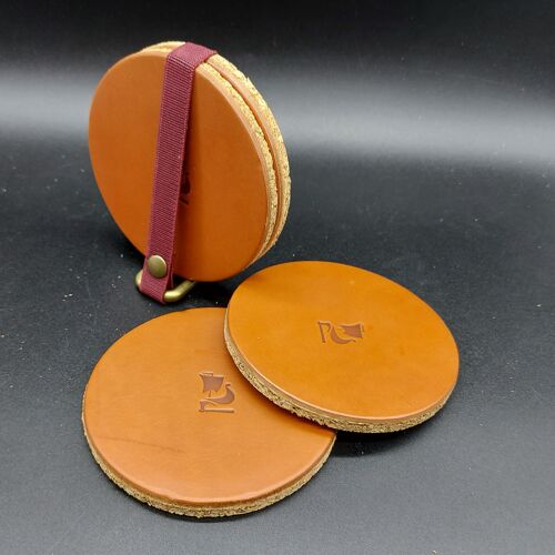 Set of 4 handmade 3mm medium brown leather coasters that come in a pack with a metal square base.Opplav Dalbanerx4