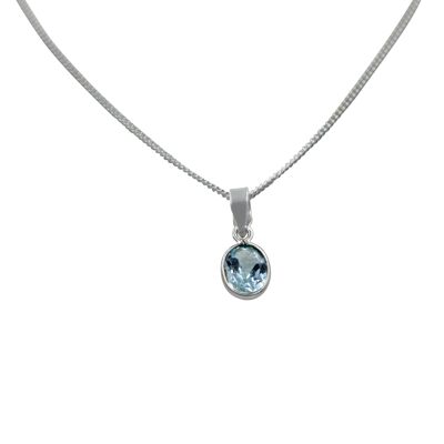 Stunning Oval Faceted Blue Topaz on a Thin Bezel Setting Exposing Much of the Shiny Stone / SKU461