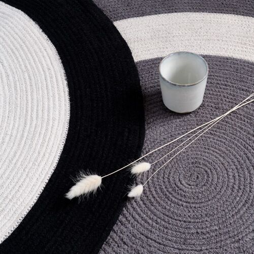 100% Cotton Black Natural Round Rug made with Dori Yarn filled with recycled fibres