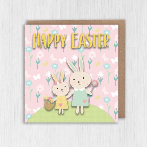Easter card: Bunny rabbits on a hill