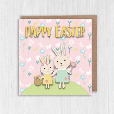 Carta di Pasqua: coniglietti su una collina