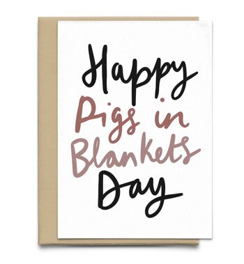 Carte de jour de cochons heureux dans des couvertures 1