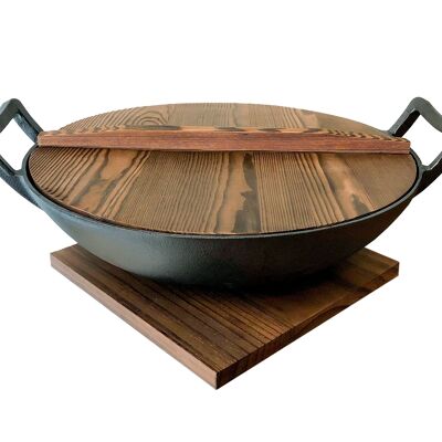 Cast iron Wok Ø 36 cm, volume 6.0 liters. With glass lid for cooking, wooden lid for serving and coasters. 39x38x16.5