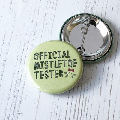 Cheeky Christmas pin Badge 'Official Mistletoe Tester' - an ideal button badge for advent calendar gifts, or secret santa office gift
