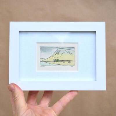 Glencoe cottage, Scotland - collagraph print in a white frame