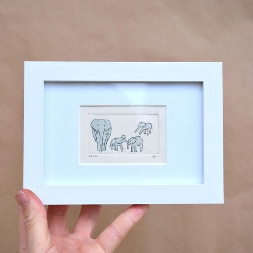 Elephant and three young - collagraph print in a white frame