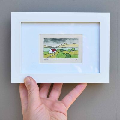 Cottage on the road to Applecross - collagraph print in a white frame
