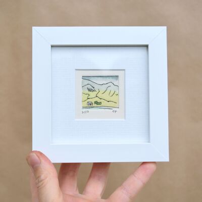 Cottage in Glencoe, Scotland - mini collagraph print in a white frame