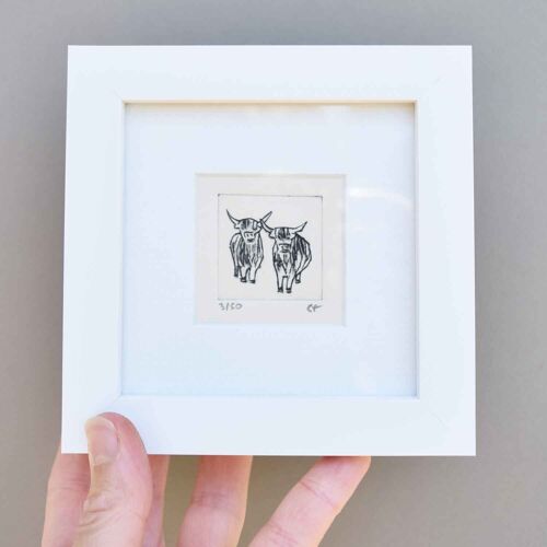 Two highland cows - mini collagraph print in a white frame