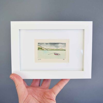 Rowing boat - collagraph print in a white frame
