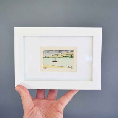 Little red boat on loch - collagraph print in a white frame
