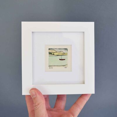Little red boat on loch - mini collagraph print in a white frame