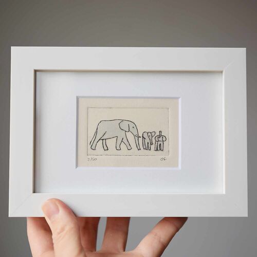 Elephant with two young - collagraph print in a white frame