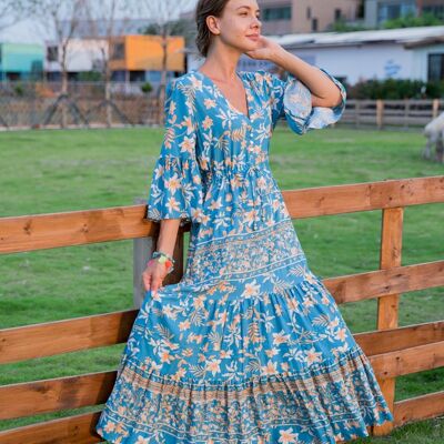 Long dress with floral print, buttoned front and V-neck