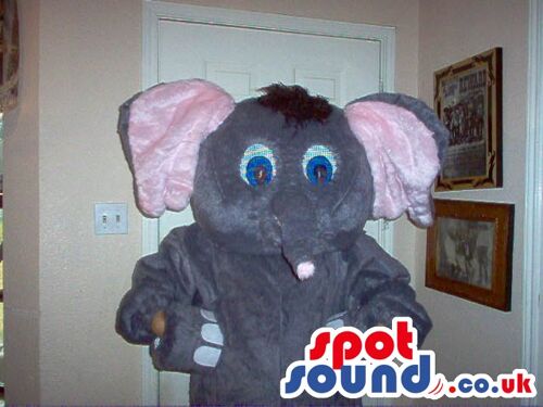 Soft brown-furred cow spotsound Mascot Costume with tail and beautiful shiny eyes .